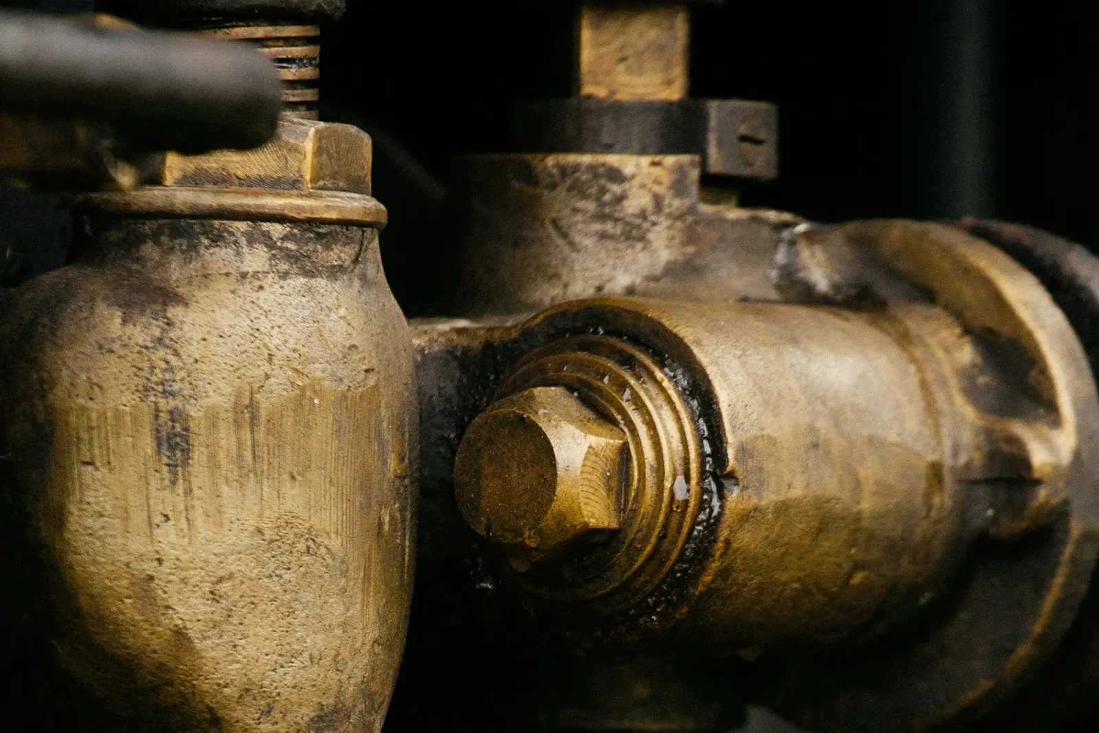 Water leaking from an old brass pipe joint